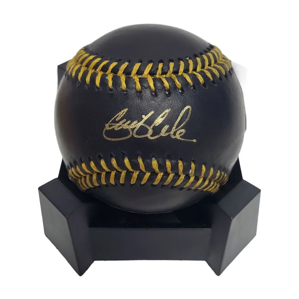 Gerrit Cole signed black Major League Baseball with gold stitching on stand