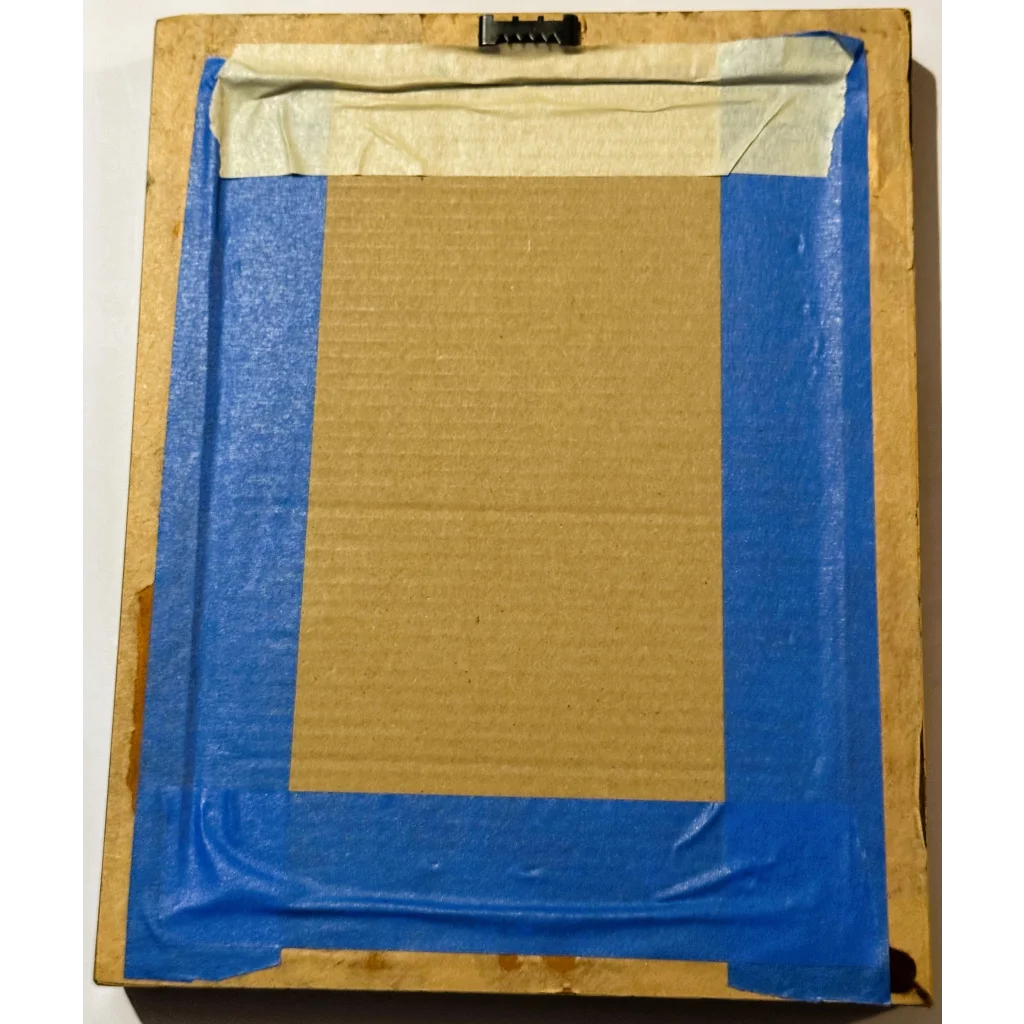 Framed button art backing with blue tape from Groovy Framed Button Art Heart radiates good vibes