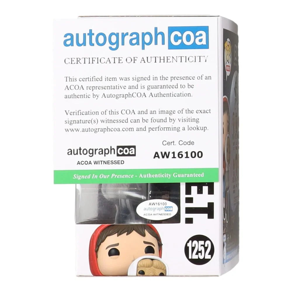 Henry Thomas signed E.T. vinyl figure with Elliott and certificate of authenticity