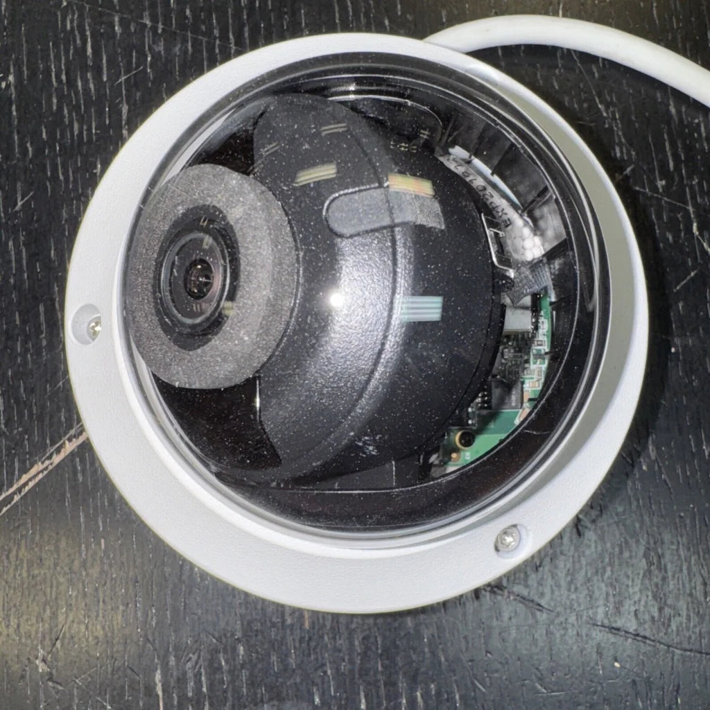 Hikvision DS-2CD1143G0-IS 4MP dome network camera with exposed circuitry