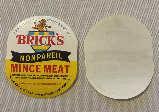 Front and back of vintage Brick's Nonpareil Mince Meat label featuring lion logo, red and yellow text on cream background, ci