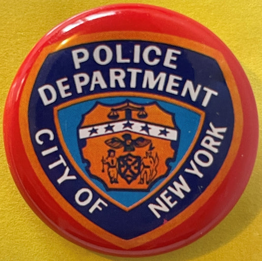 Vintage NYPD Police Department City of New York circular tin pinback button with red rim and shield badge on yellow backgroun