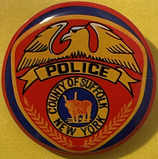 Vintage tin litho pin-back button featuring eagle, "Police" banner, and "County of Suffolk New York" seal in red, gold, and n