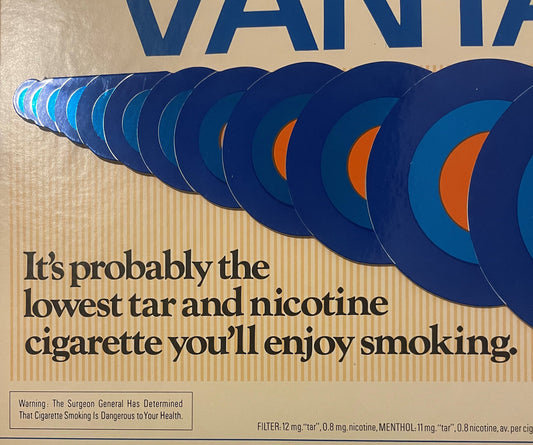 Vintage Vantage cigarette store display sign with blue moon phases and orange crescent, beige background, black text and Surg