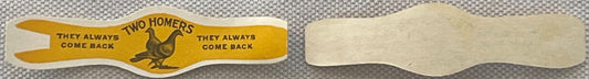 Vintage cigar band with yellow front featuring rooster and "Two Homers" text, plain back shown for comparison against texture