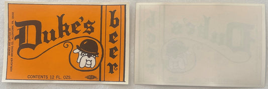 Vintage orange beer label for Dukes beer showing a bulldog wearing a bowler hat, with text indicating Horlacher Brewing Compa