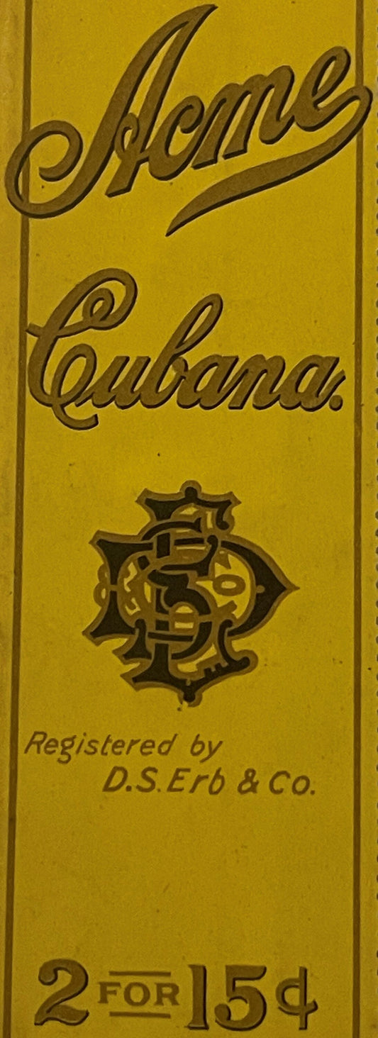 Yellow embossed cigar bag label reading "Acme Cubana" with ornate monogram, registered by D.S. Erb & Co, priced 2 for 15¢