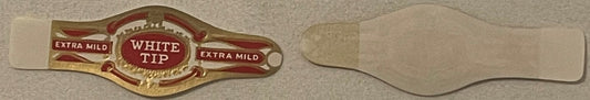Vintage cigar band with red and gold embossed design reading "White Tip Extra Mild" shown front and back against neutral back