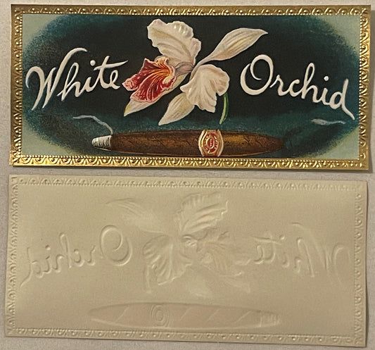 Antique cigar box label with white orchid flower and cigar illustration, embossed gold border, cream and dark green backgroun