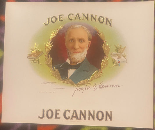 Antique chromolithograph cigar box label featuring portrait of bearded man in formal attire surrounded by gold laurel wreath,