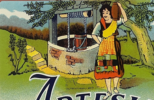 Vintage Artesian Birch Beer bottle label featuring a smiling woman in traditional folk dress holding an axe next to a well, w