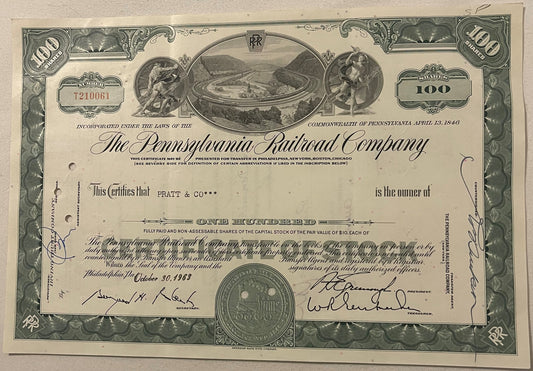 Vintage Pennsylvania Railroad stock certificate for 100 shares, printed in green and black with ornam