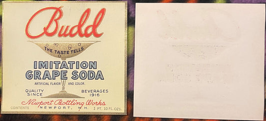 Vintage Budd Imitation Grape Soda label with red script logo, cream background, and Newport Bottling Works text, shown front