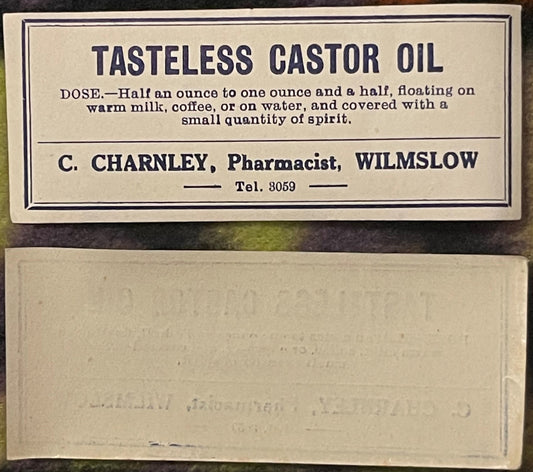 Vintage pharmacy label for Tasteless Castor Oil from C. Charnley, Pharmacist, Wilmslow, with dosage instructions