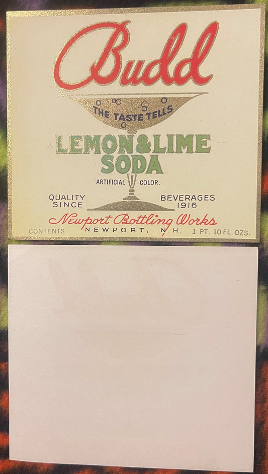 Vintage Budd Lemon & Lime Soda label from Newport Bottling Works, cream and gold with red text, showing bottle contents of 1