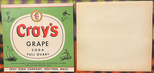 Vintage Cray's Grape Soda label from Holyoke, Mass., showing green background with cream circular center and red text, displa