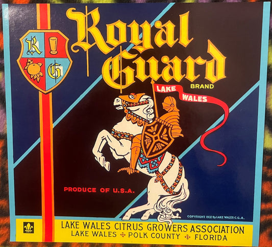 Vintage Royal Guard citrus crate label featuring ornate knight on rearing horse, yellow text on dark blue background, Lake Wa