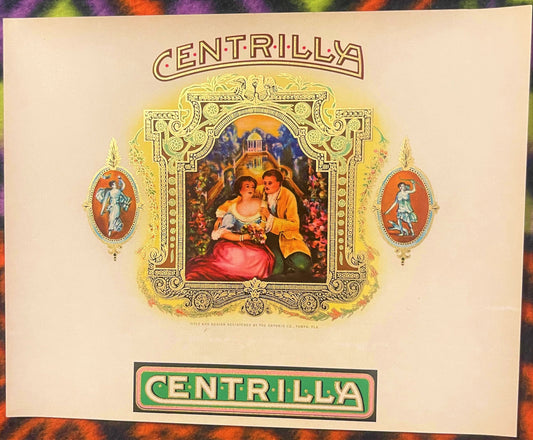 Antique Centrilla cigar label with ornate gold frame, central romantic scene of couple, flanking oval medallions, and green b
