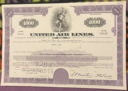 Vintage United Air Lines $1000 debenture bond certificate from 1967 in purple and cream with ornate border design and central
