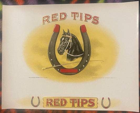 Vintage cigar label with "Red Tips" text, black horse head centered in horseshoe with red-tipped matches, gold and red letter