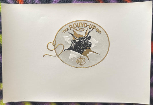 Embossed cigar label featuring a bull's head in a rope circle with "The Round-Up" text and decorative rope border on cream pa