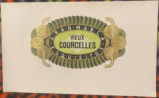 Ornate vintage cigar label with gold and green embossed design reading "Vieux Courcelles" and "Gran Marca" on cream paper.
