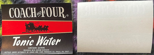 Vintage Coach and Four tonic water label showing black and red design with coach silhouette, displayed flat next to blank whi