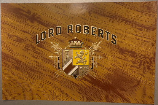 Gold embossed cigar label with "LORD ROBERTS" text, heraldic coat of arms with crown, and wood grain background texture