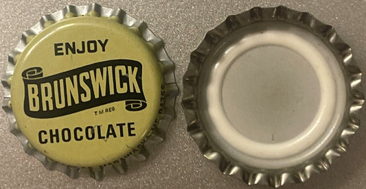 Vintage Brunswick Chocolate soda bottle cap, yellow front and silver reverse, shown front and back view on gray surface