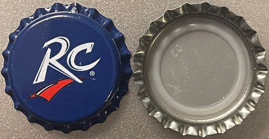 Front and back of a blue RC Royal Crown Cola bottle cap with white logo and red swoosh, next to its silver metal underside on