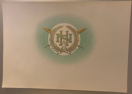 Cream-colored embossed cigar label with gold foil monogram "N&H" and "8" centered in laurel wreath with crossed wheat stalks,