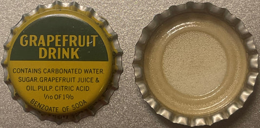 Vintage grapefruit drink bottle cap, front and back views, showing yellow and green lithographed design with ingredients list
