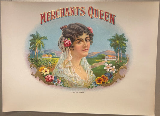 Vintage embossed cigar label featuring a woman in lace headwear with flowers, palm trees and countryside estates in backgroun