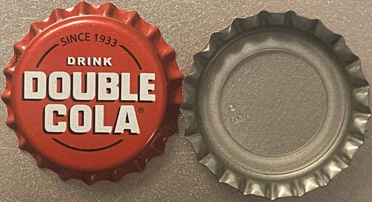 Red and silver bottle caps shown front and back, red cap printed "Since 1933 Drink Double Cola" with registered trademark sym