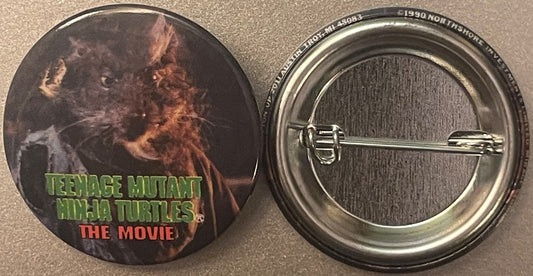 Front and back of a circular metal pinback button featuring Splinter from Teenage Mutant Ninja Turtles movie with green and r