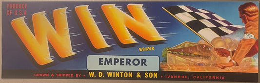 Vintage fruit crate label with orange "WIN" letters, "EMPEROR" brand text, checkered flag, and illustration of man picking gr