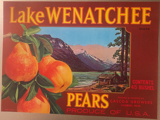 Vintage Lake Wenatchee pear crate label with golden text, illustration of three orange pears on left, mountain lake landscape