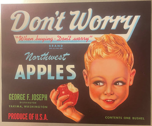 Vintage apple crate label with smiling child's face, red apple, and "Don't Worry" text on brown background, George F. Joseph