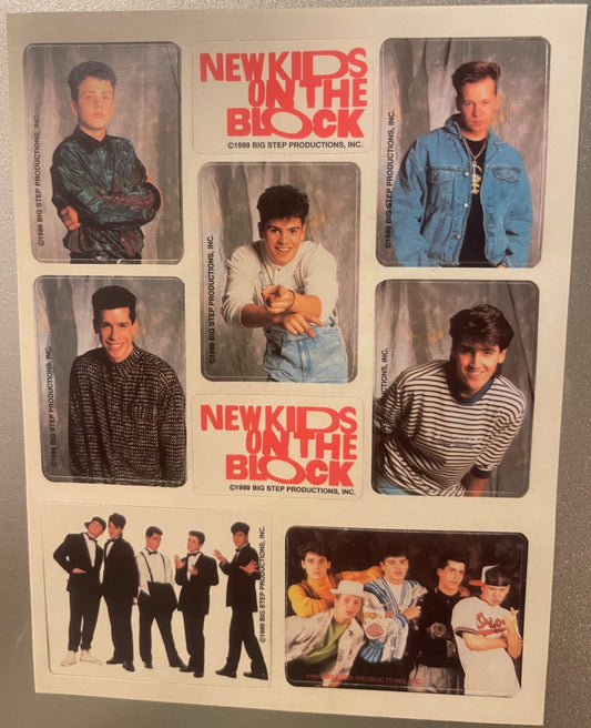 Vintage 1989 New Kids on the Block sticker sheet featuring five individual member portraits and group photos in colored frame