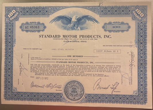 Vintage Standard Motor Products stock certificate for 100 shares, featuring eagle emblem and ornate blue border design o