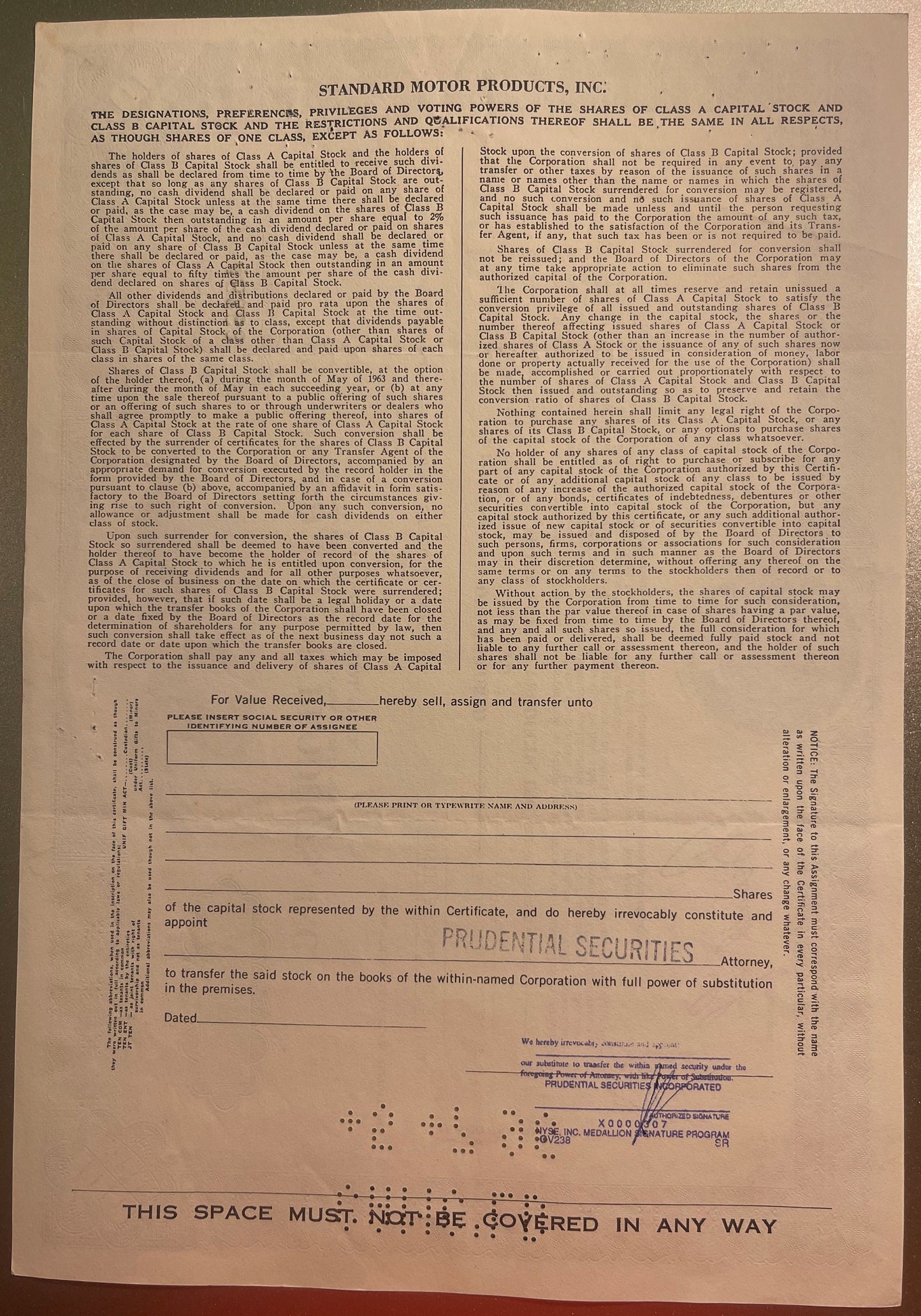 Aged Standard Motor Products stock certificate from 1970s on cream paper with printed text, blank fields, and Prudential Secu