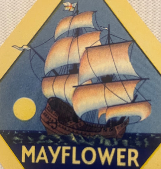 Vintage Mayflower broom label featuring a sailing ship with tan sails, dark hull, yellow moon, and yellow border on blue back