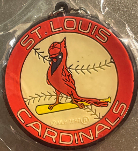 Red and cream circular keychain with St. Louis Cardinals logo featuring cardinal bird on yellow baseball bat, surrounded by r