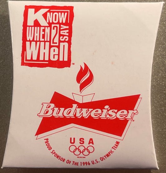 Sealed white envelope featuring red Budweiser logo, Olympic rings, and "Know When 2 Say When" text, displayed flat on concret