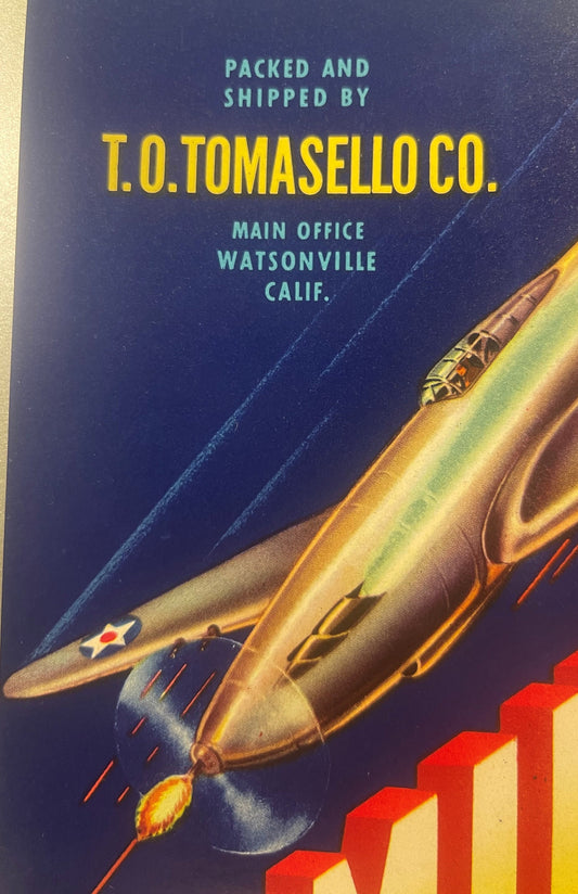 Vintage crate label with navy blue background, yellow text reading "T.O. TOMASELLO CO." and teal text for "WATSONVILLE CALIF.