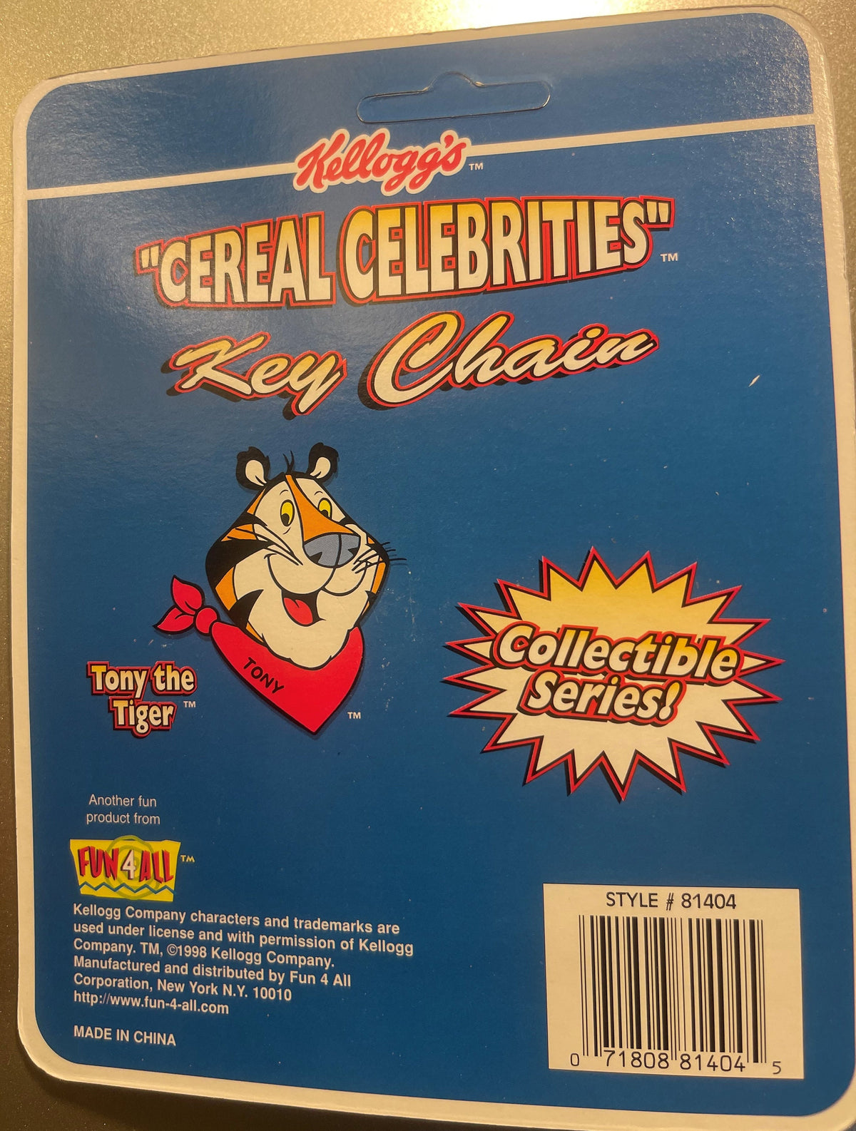 Sealed blue packaging for Kellogg's Cereal Celebrities Tony the Tiger key chain by Fun 4 All, showing cartoon tiger mascot