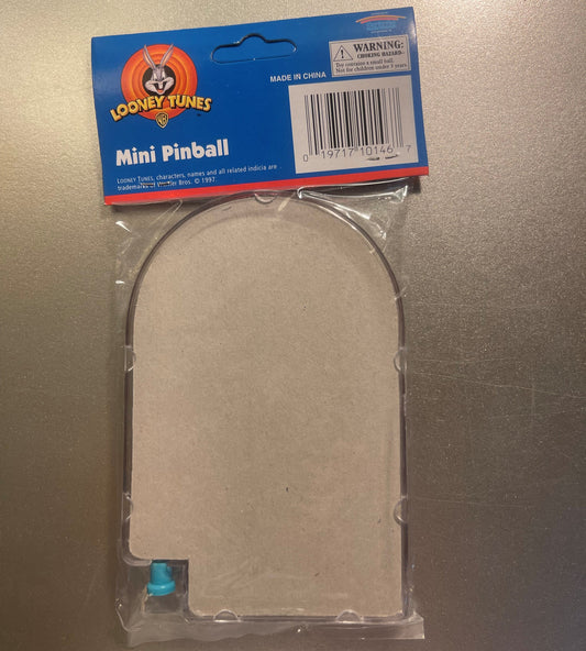 Looney Tunes Mini Pinball game in clear plastic packaging with blue header card showing Bugs Bunny logo, barcode visible, sma