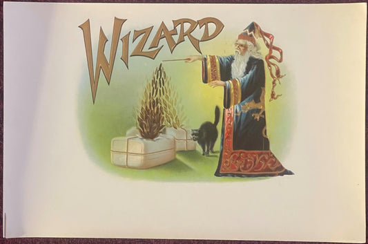 Vintage "Wizard" gold-embossed cigar label featuring a bearded wizard in blue robes casting magic at a flaming cauldron with