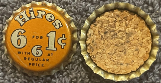 Vintage Hires Root Beer bottle cap, orange side showing "6 for 1¢" text, cork interior visible on reverse side