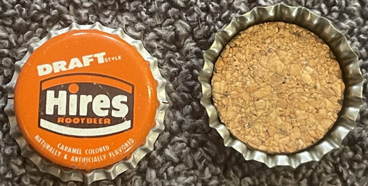 Vintage Hires root beer bottle cap shown front and back, orange side displays "Draft Style" and "Hires Root Beer" text, rever
